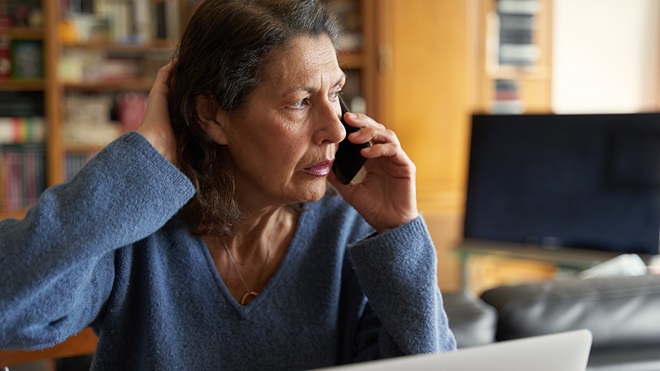 senior_person_on_phone_to_scammer